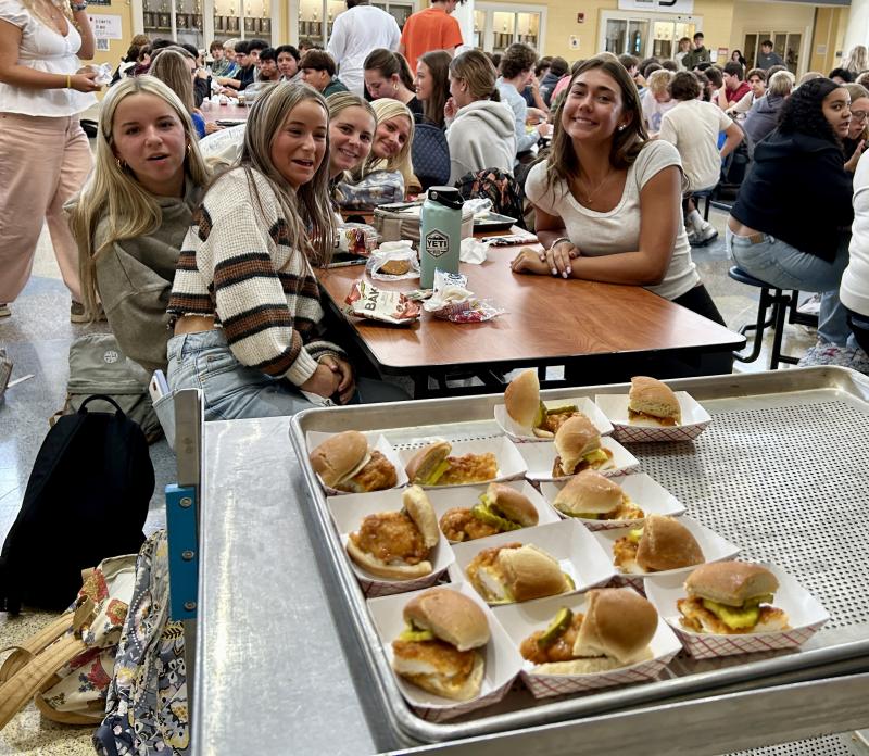 Eyeing up a tray of Nashville spicy chicken sandwiches are (l-r) Cadence Hedrick, Carmen Williams, Makenzie Todd, Haley Gamuciello and Maile Godwin.